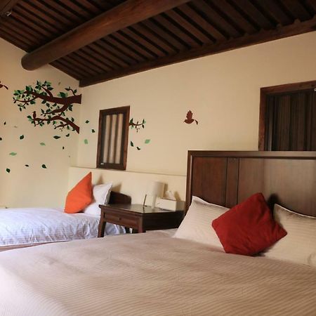 Longmen Inn Bed And Breakfast Jinning Экстерьер фото